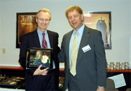 Tom Donovan accepts an award on behalf of the Bean Foundation